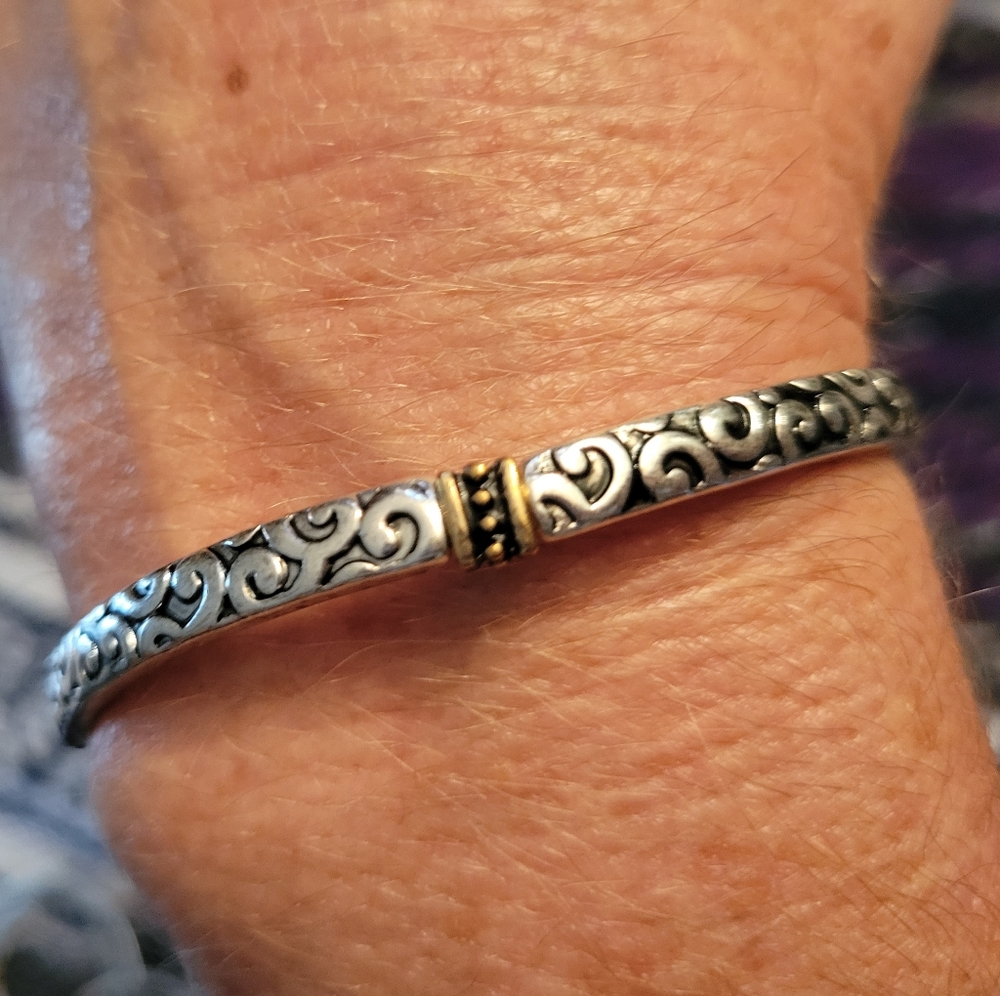 Howards silver and gold tone stretchy bracelet